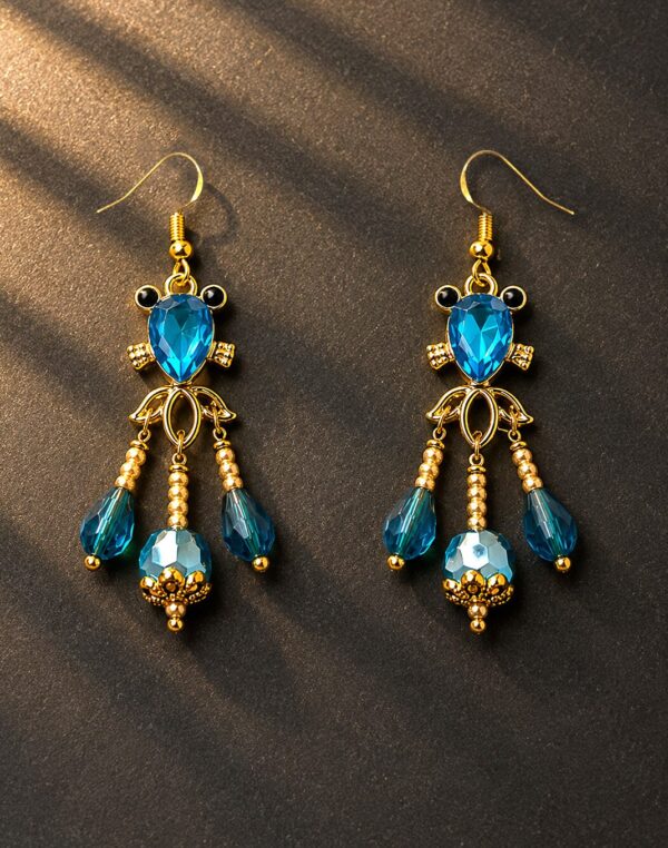 Blue Swimming Fish — handmade one-of-a-kind jewelry by The Kingwood Collection